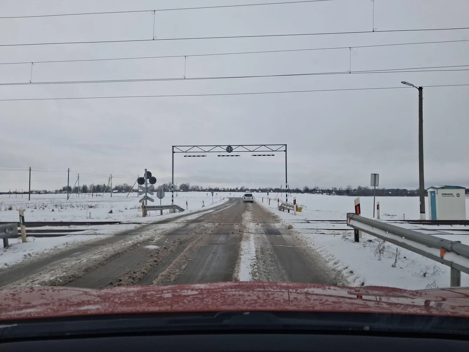 Street-level view of a level crossing in Lithuania