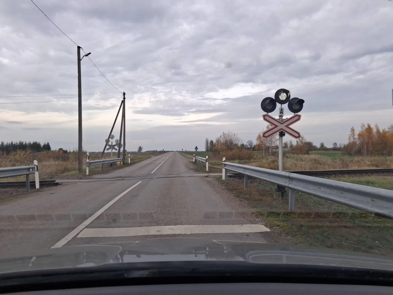 Street-level view of a level crossing in Lithuania