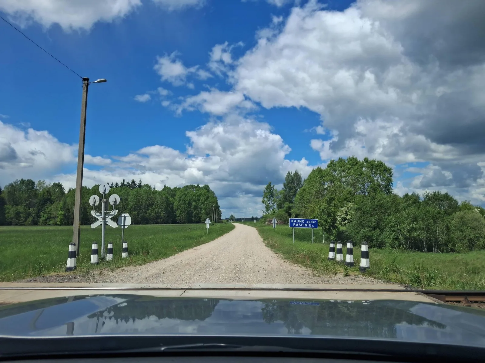 Street-level view of a level crossing in Lithuania