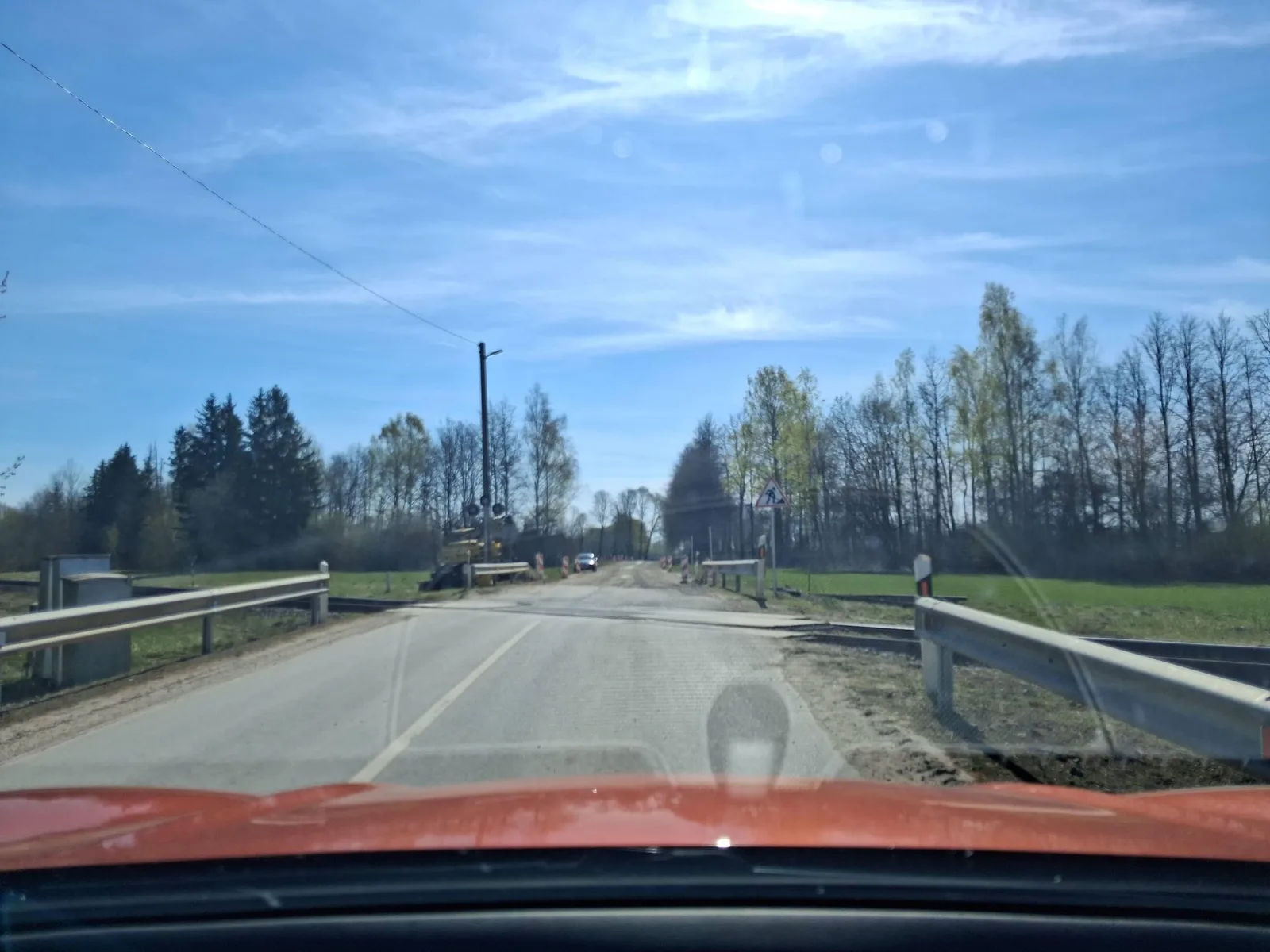 Street-level view of a level crossing in Lithuania