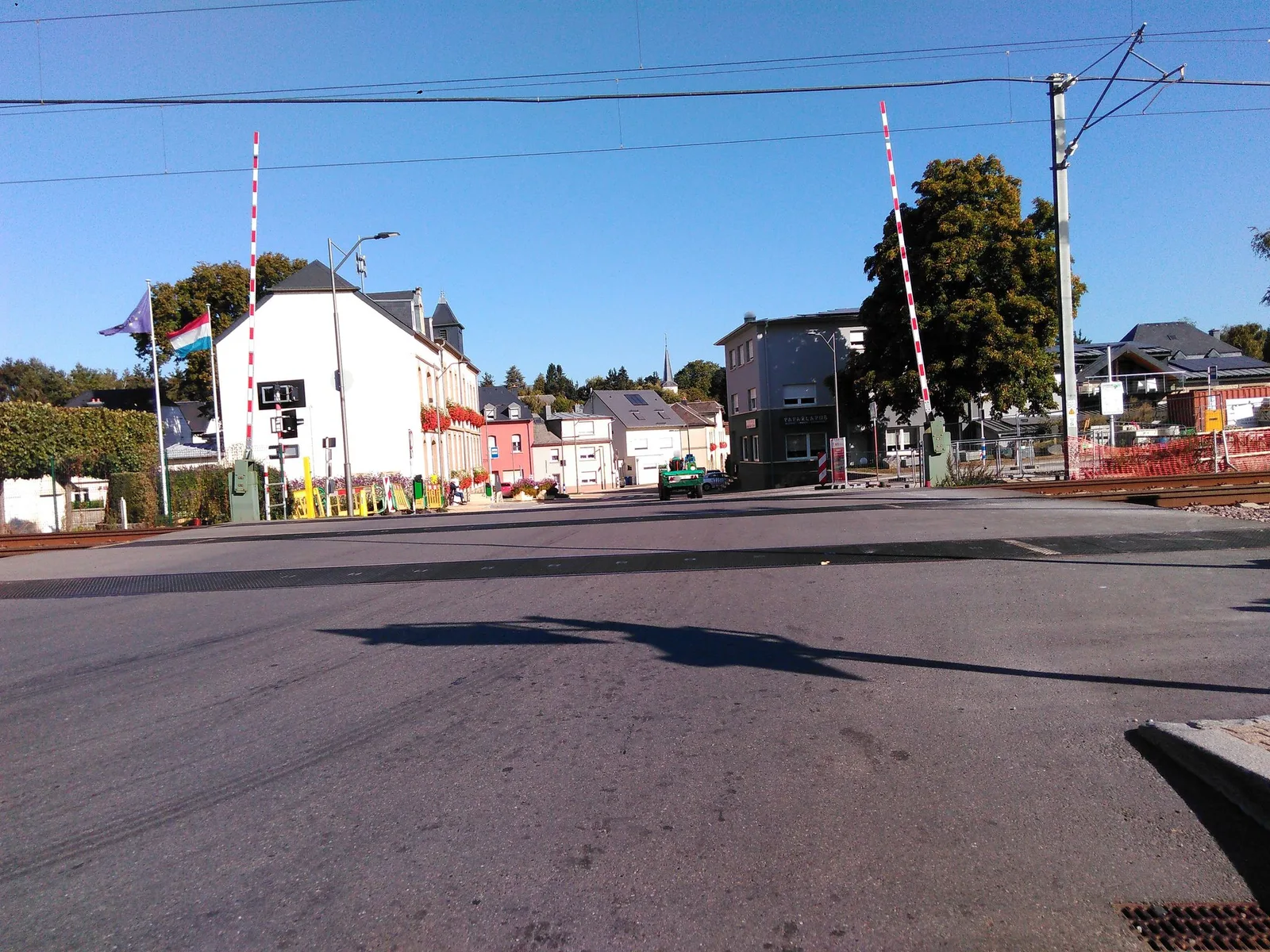 Street-level view of a level crossing in Luxembourg