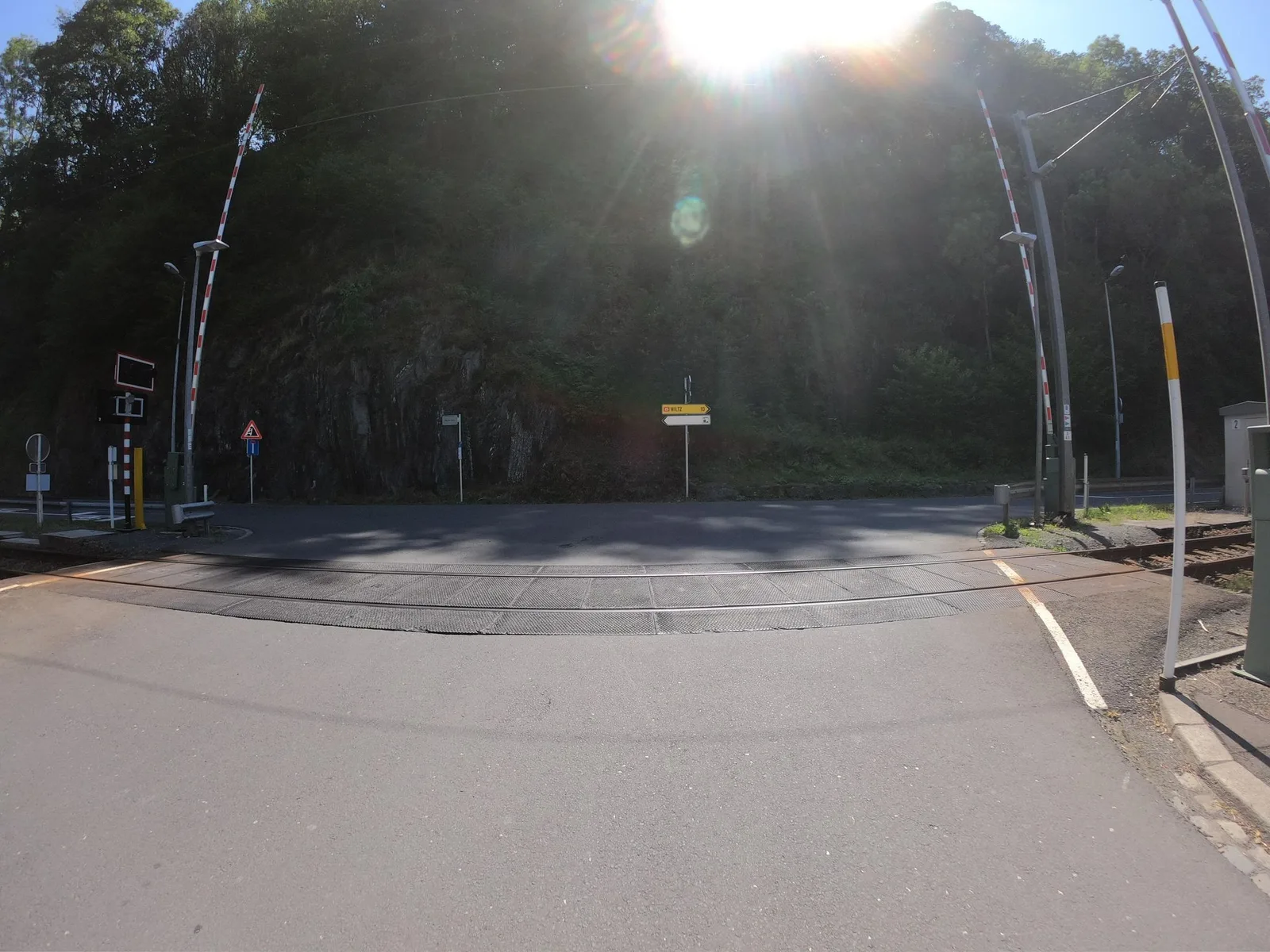 Street-level view of a level crossing in Luxembourg