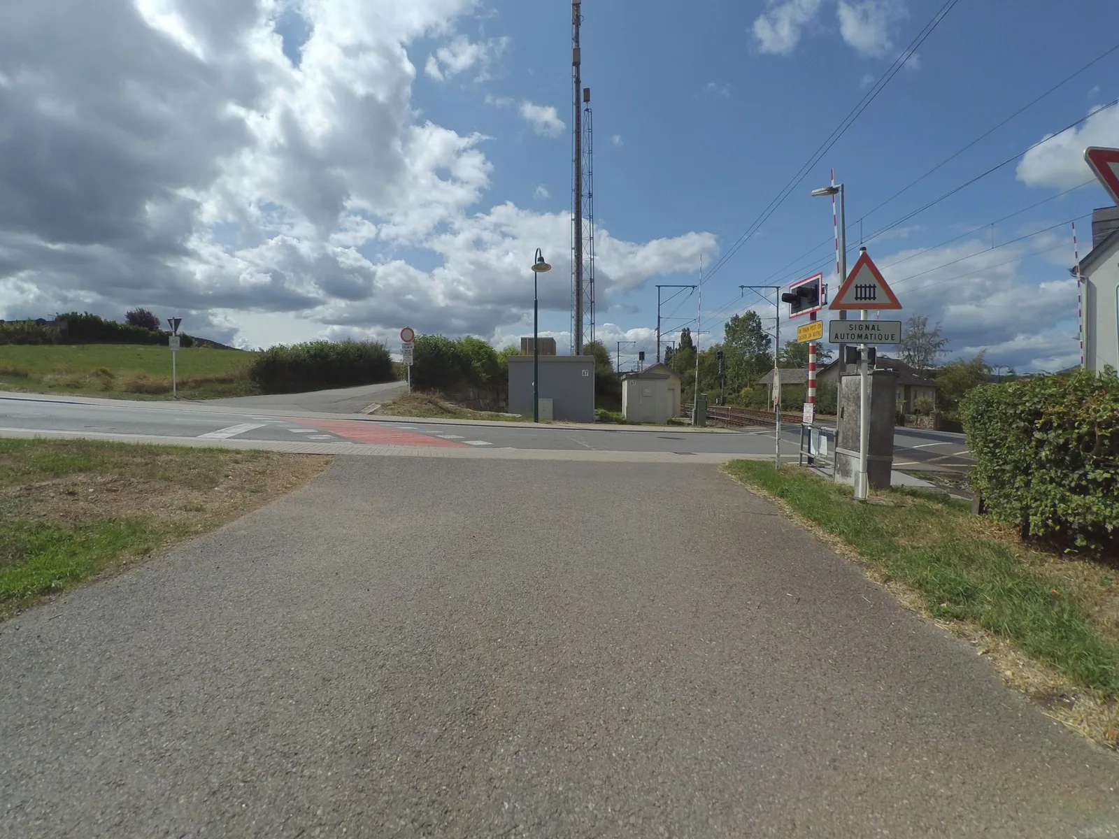 Street-level view of a level crossing in Luxembourg
