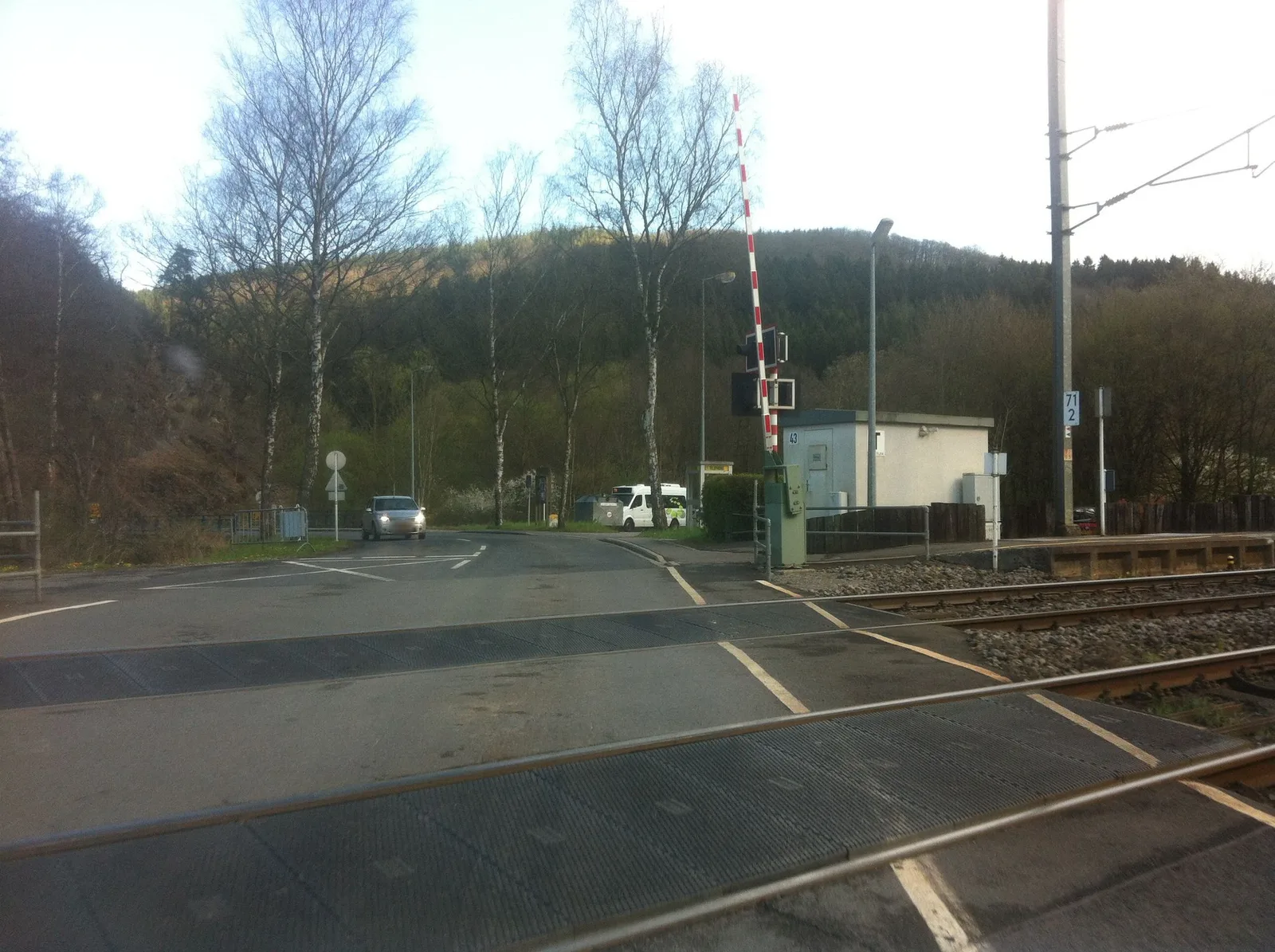 Street-level view of a level crossing in Luxembourg