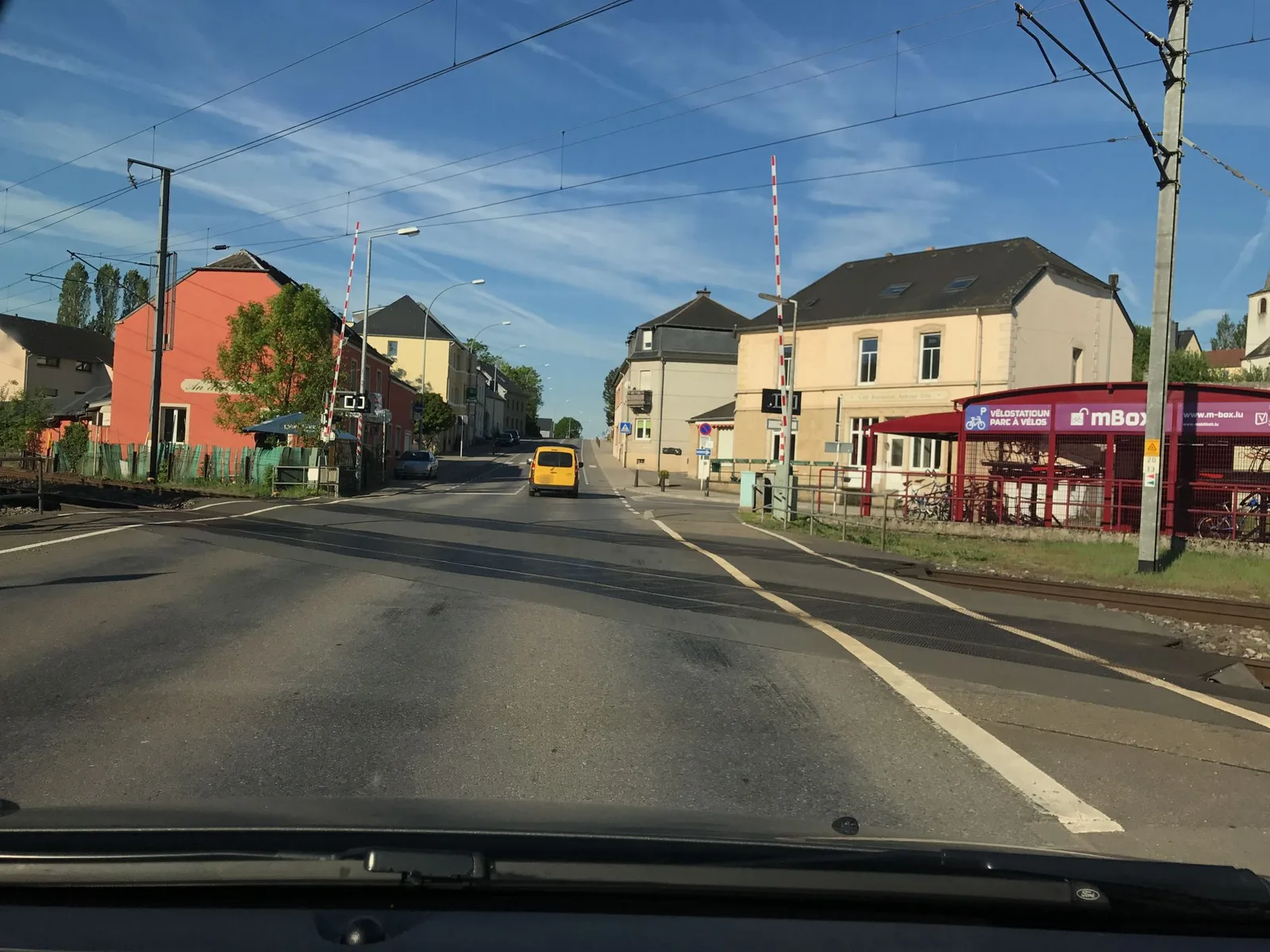 Street-level view of a level crossing in Luxembourg