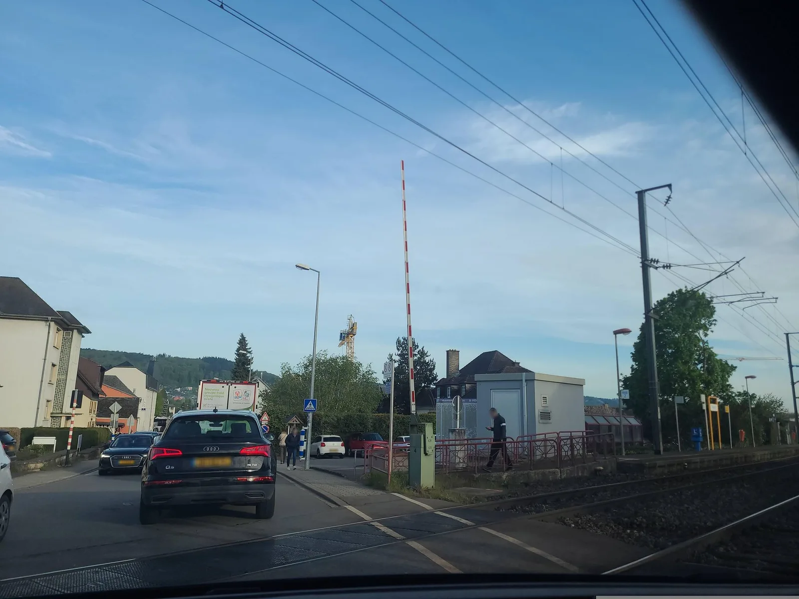 Street-level view of a level crossing in Luxembourg