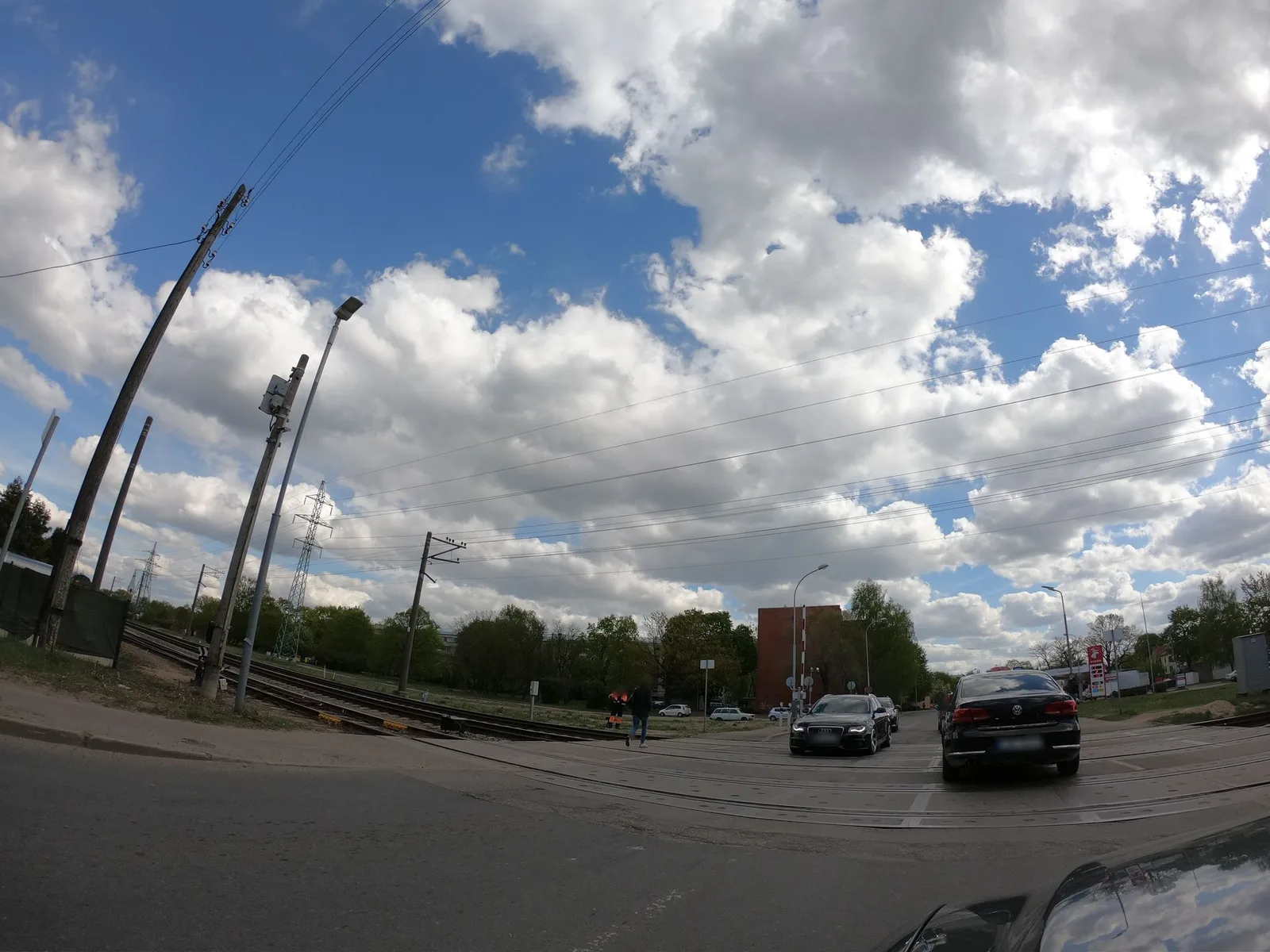 Street-level view of a level crossing in Latvia