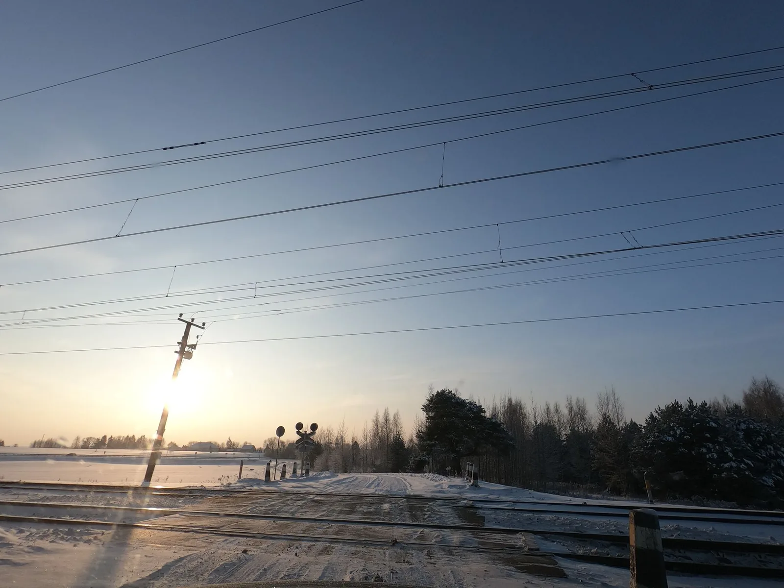Street-level view of a level crossing in Latvia