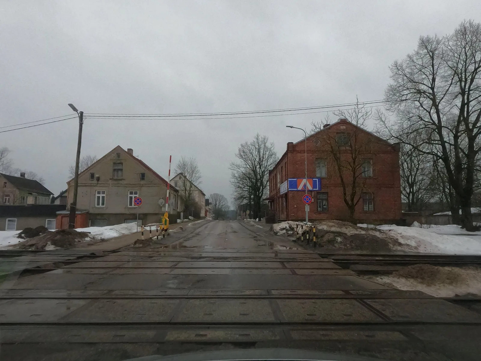 Street-level view of a level crossing in Latvia