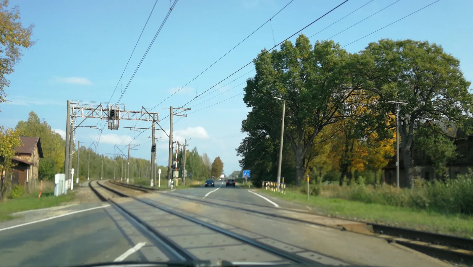 Street-level view of a level crossing in Latvia