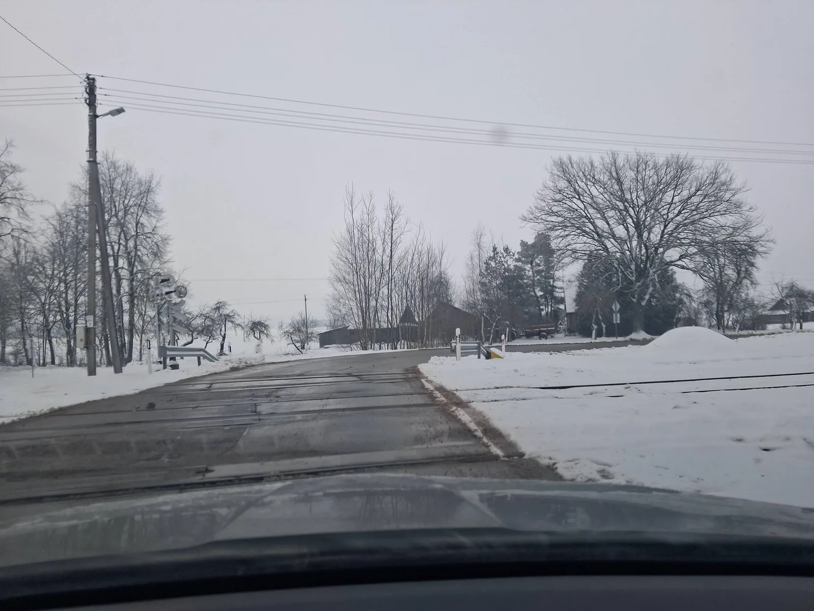 Street-level view of a level crossing in Latvia