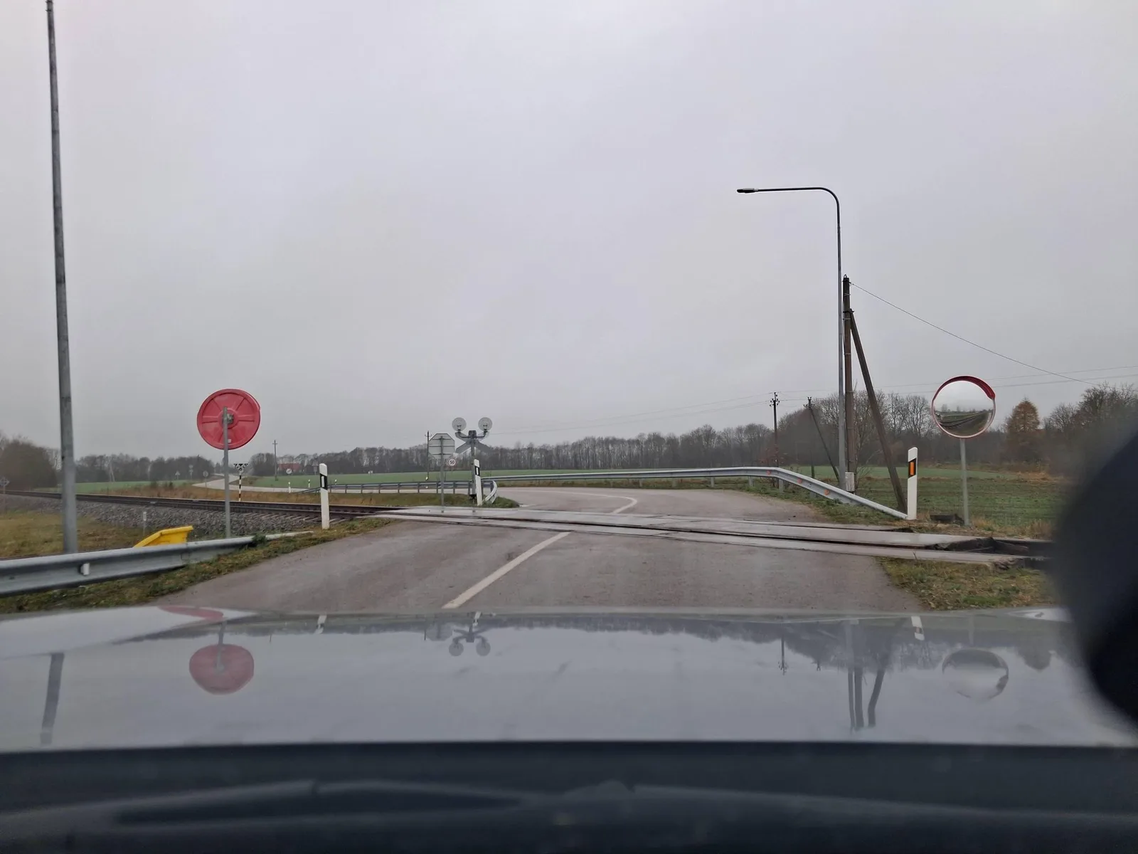 Street-level view of a level crossing in Latvia