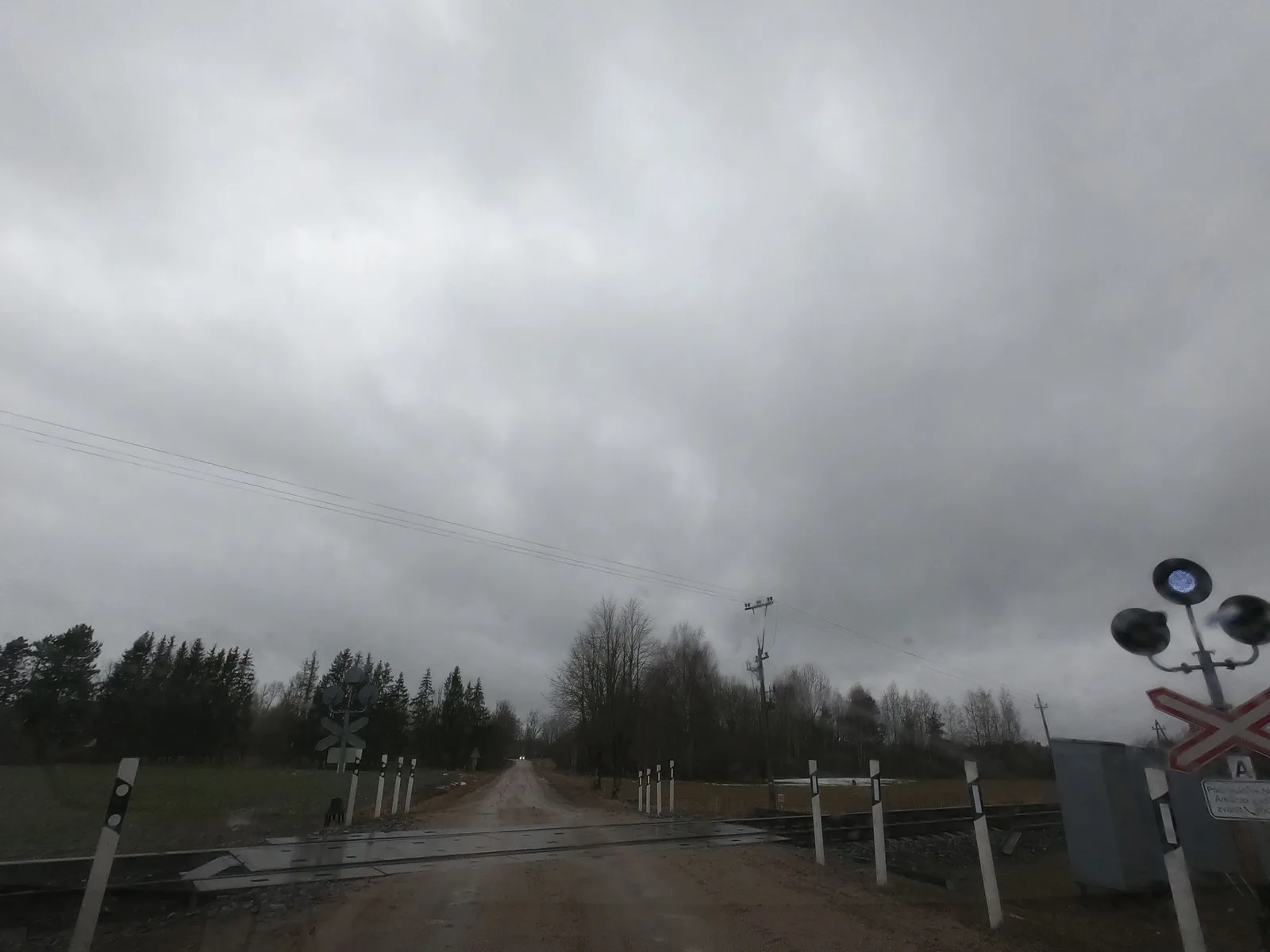 Street-level view of a level crossing in Latvia