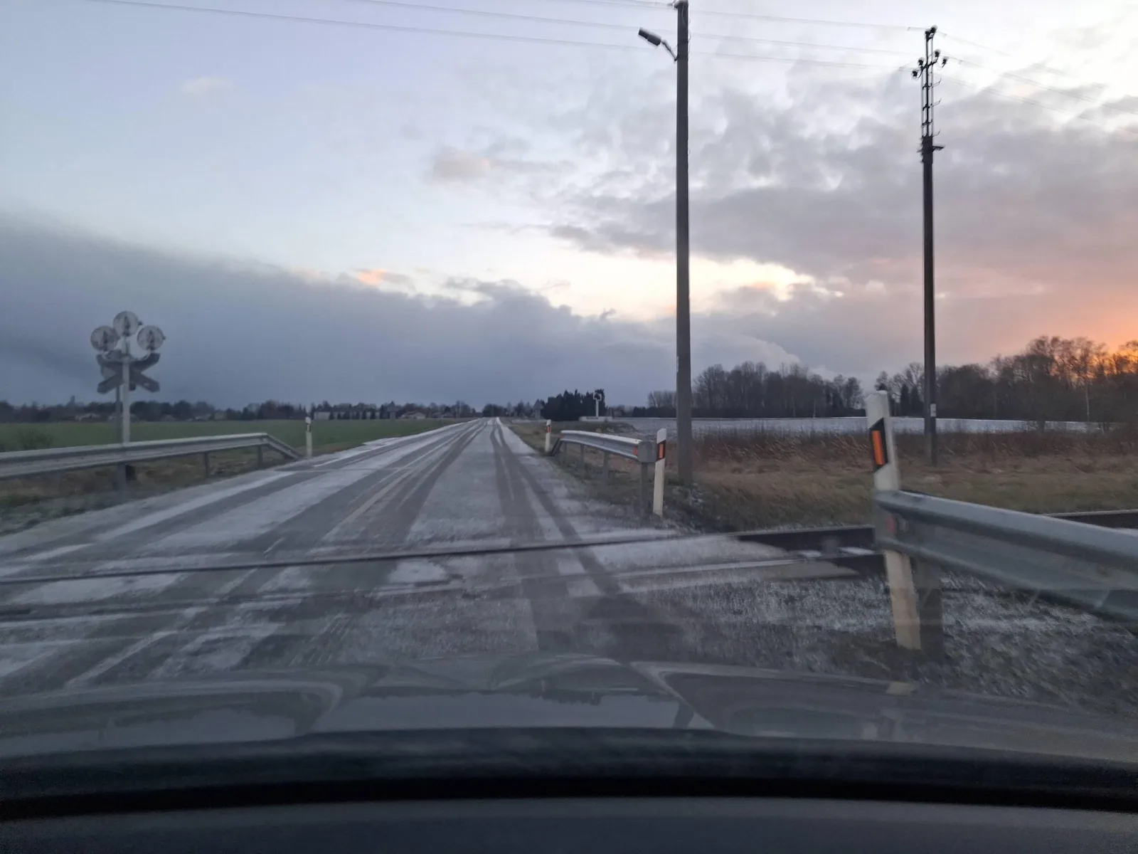 Street-level view of a level crossing in Latvia
