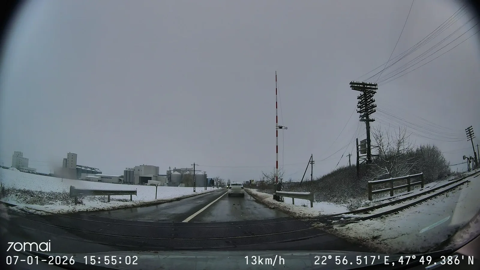 Street-level view of a level crossing in Romania