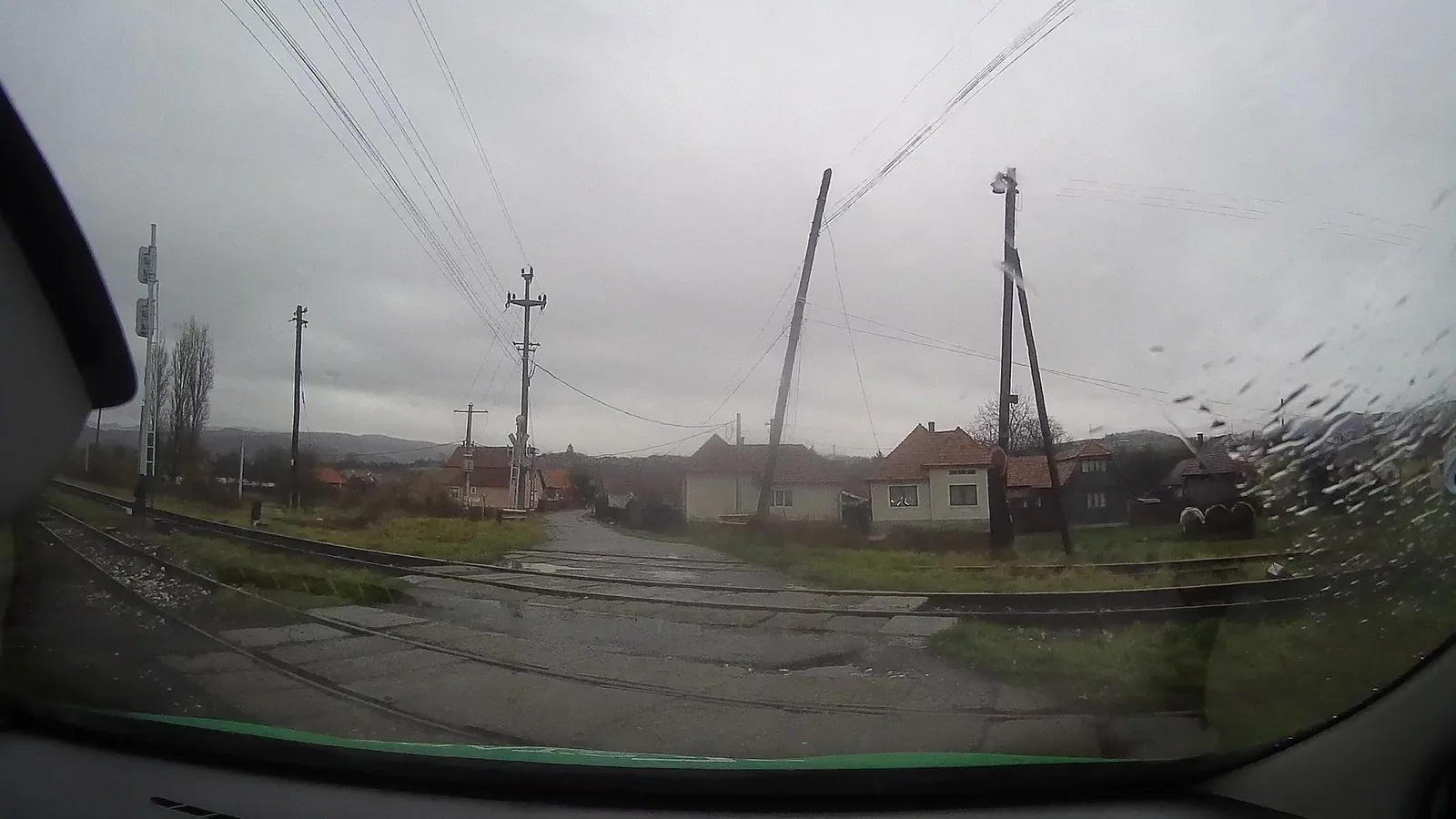 Street-level view of a level crossing in Romania