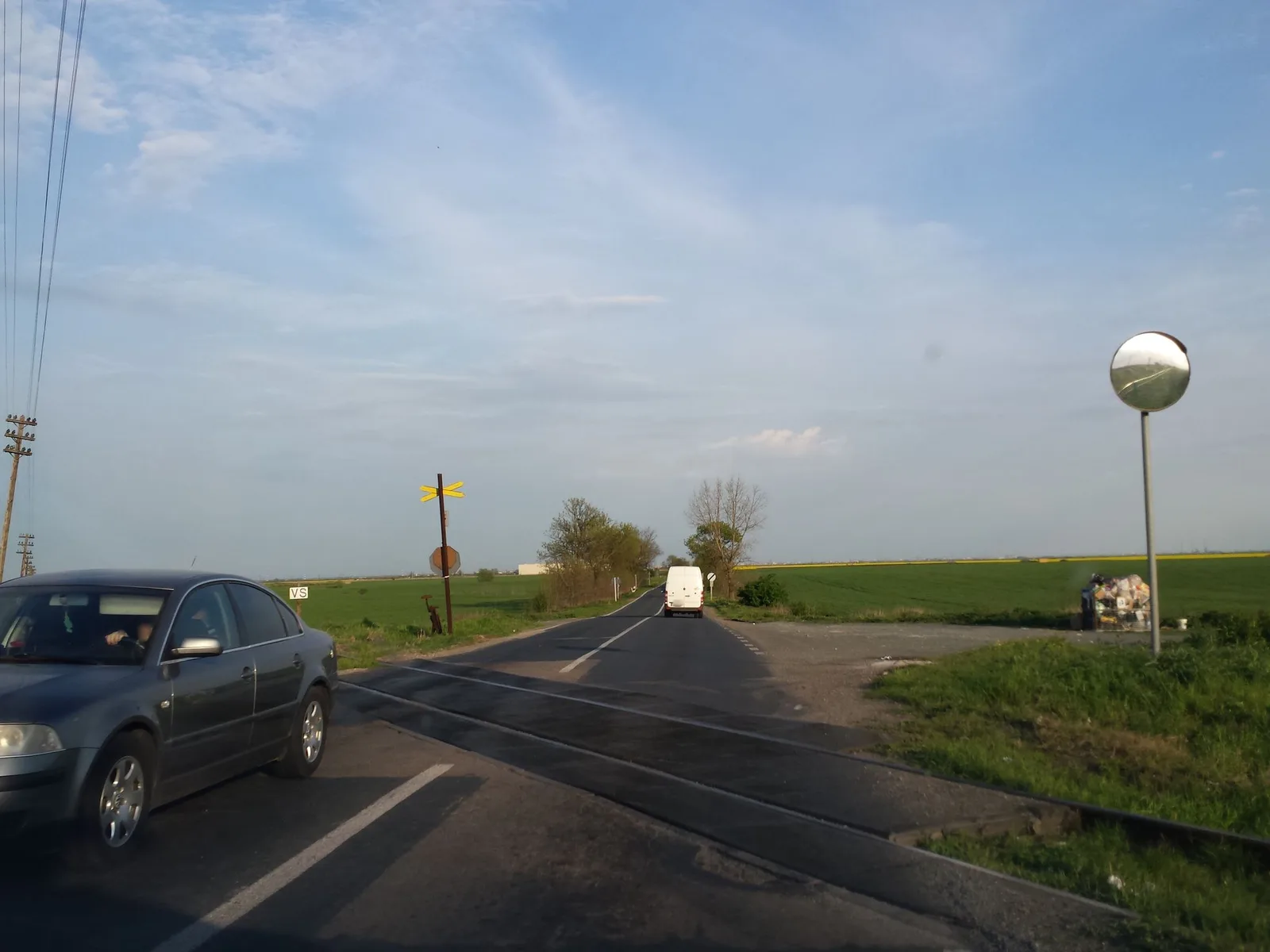 Street-level view of a level crossing in Romania