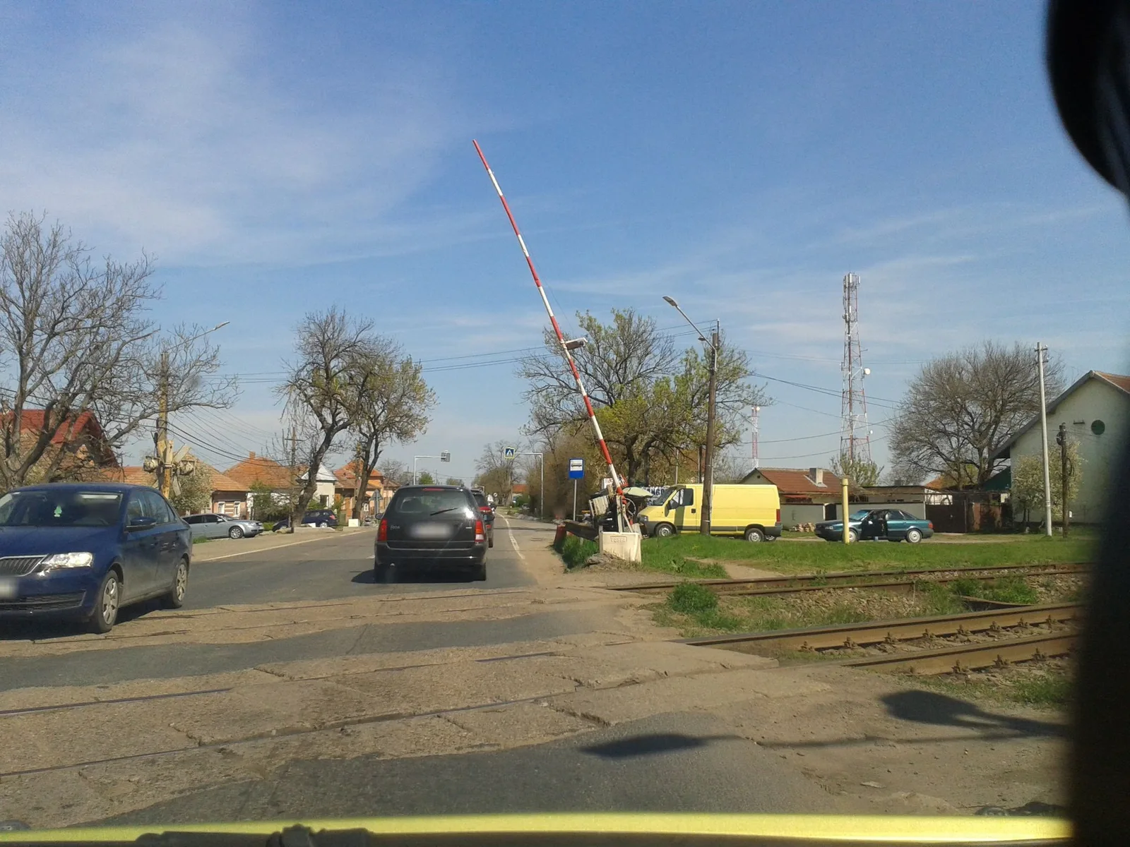 Street-level view of a level crossing in Romania
