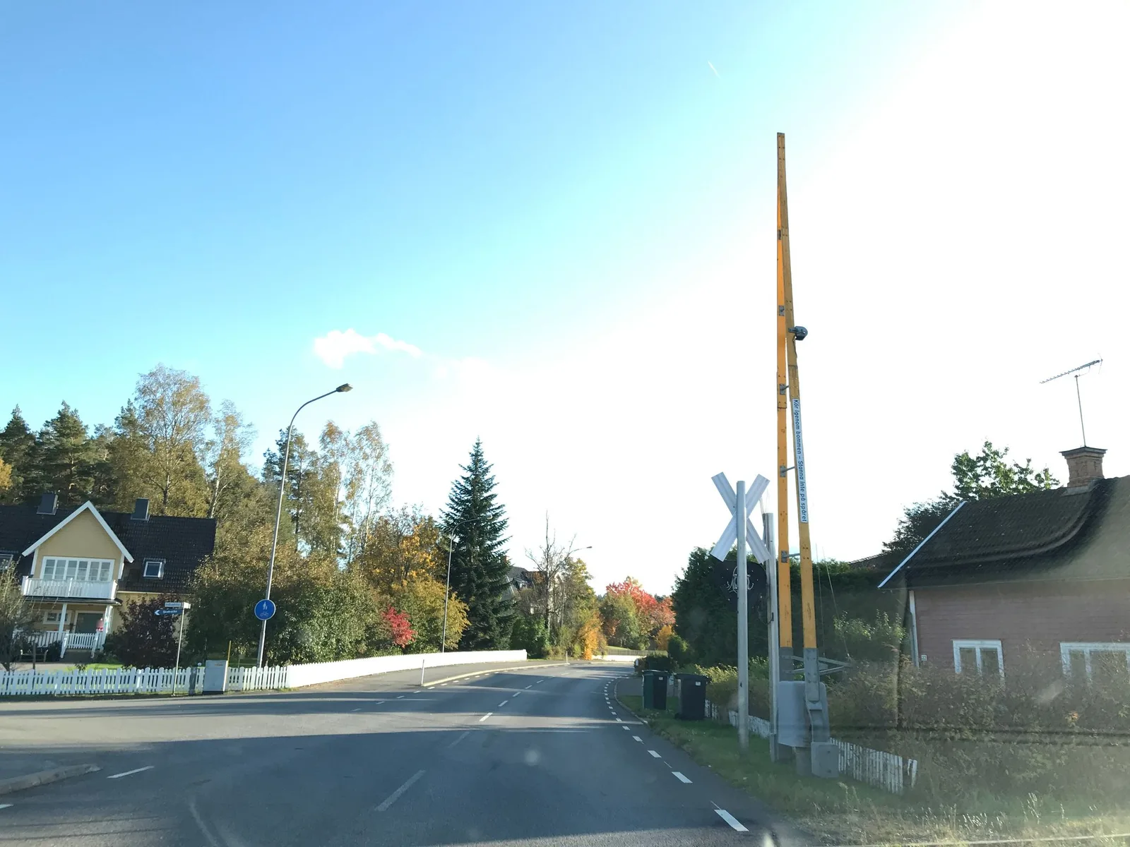 Street-level view of a level crossing in Sweden