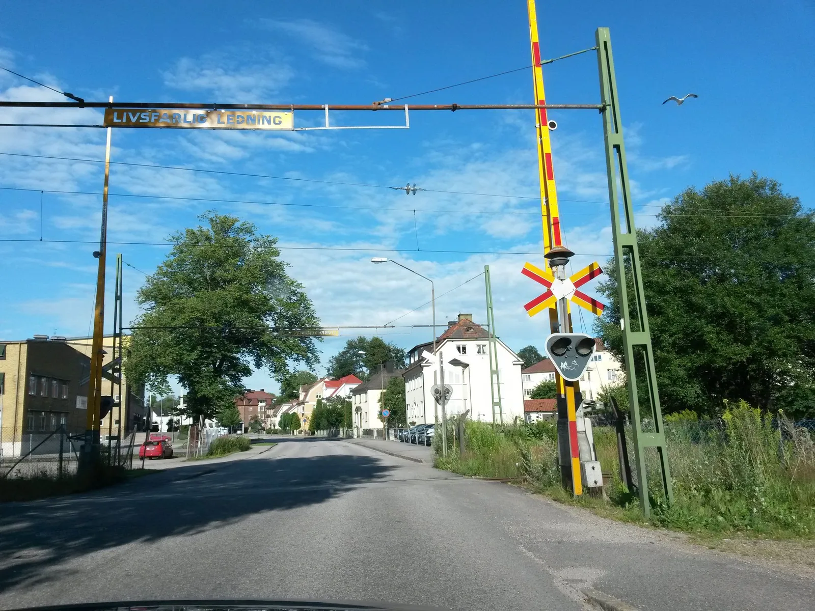 Street-level view of a level crossing in Sweden