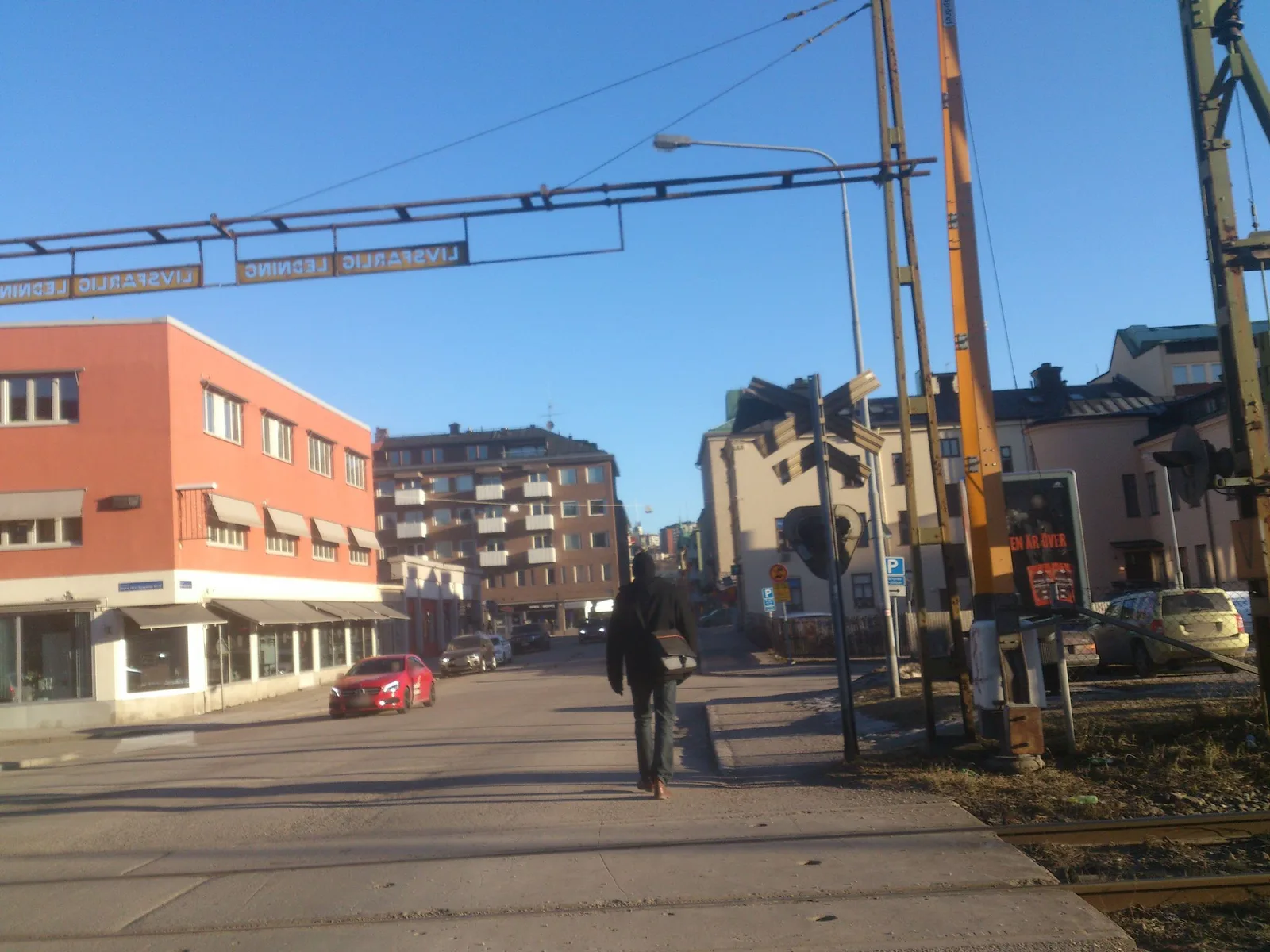 Street-level view of a level crossing in Sweden