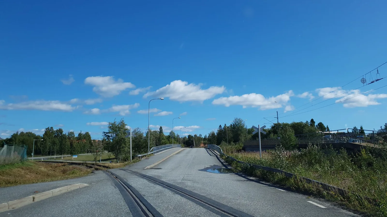 Street-level view of a level crossing in Sweden