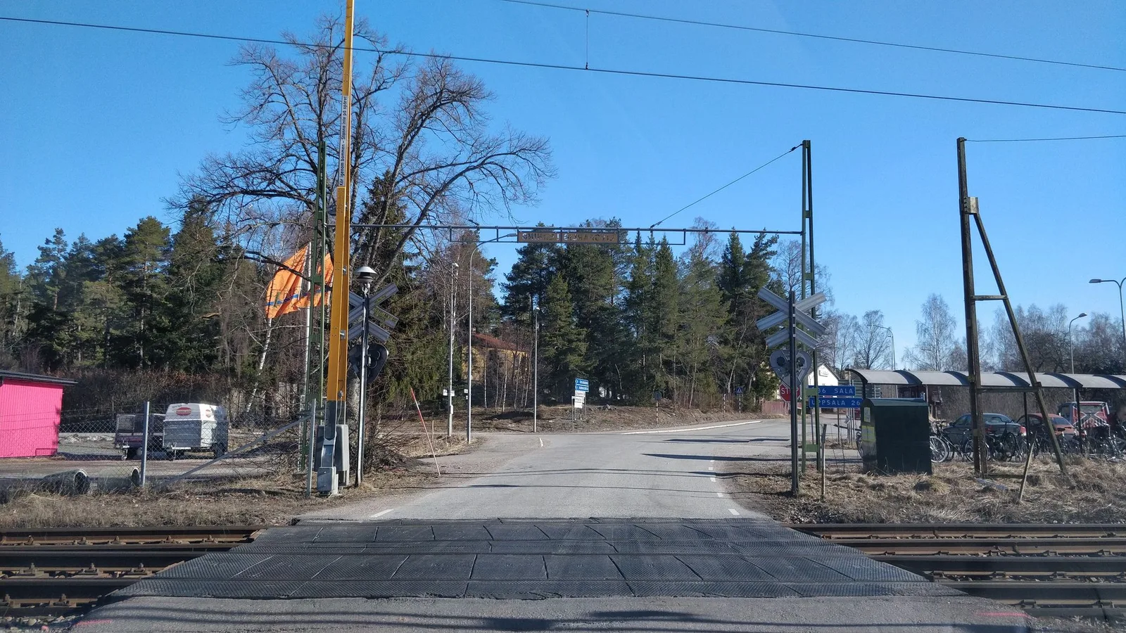 Street-level view of a level crossing in Sweden
