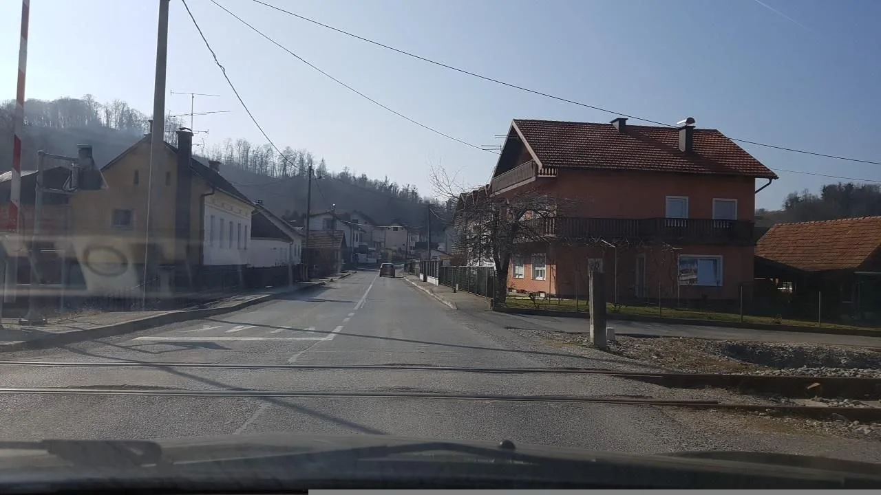 Street-level view of a level crossing in Slovenia