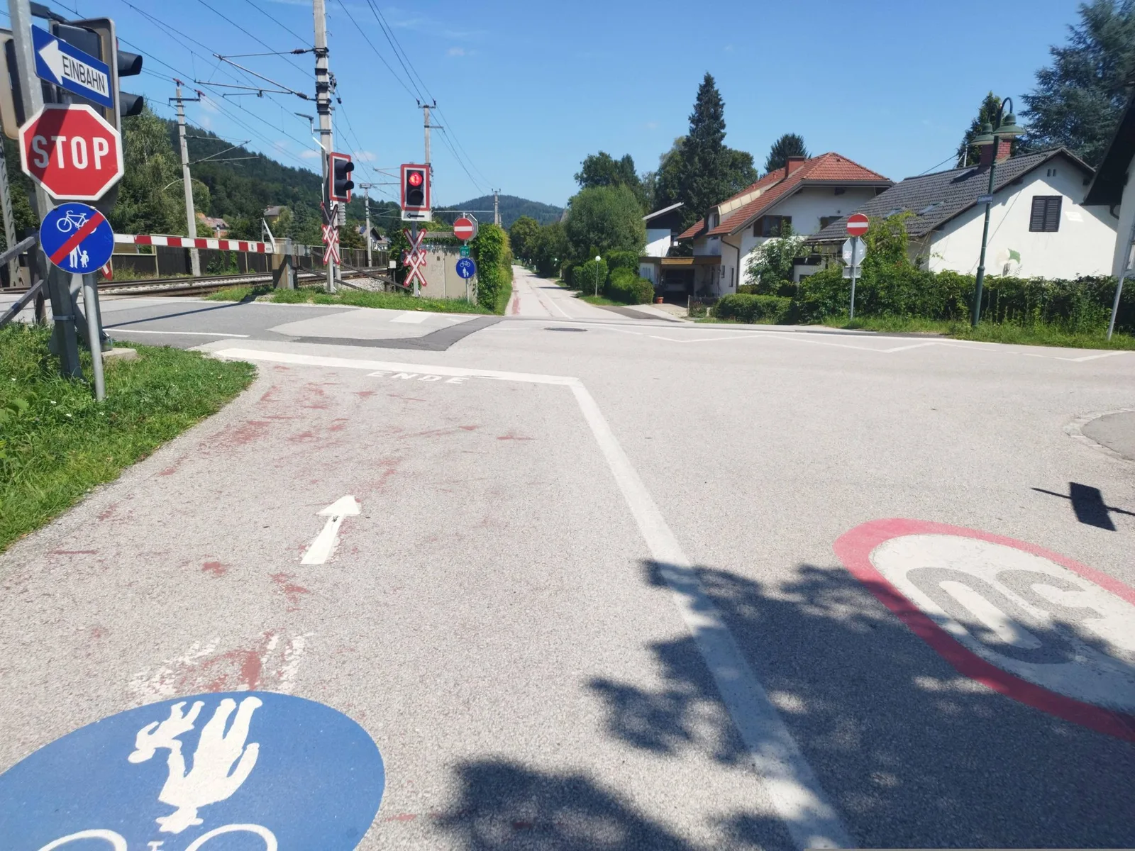 Street-level view of a level crossing in Slovenia
