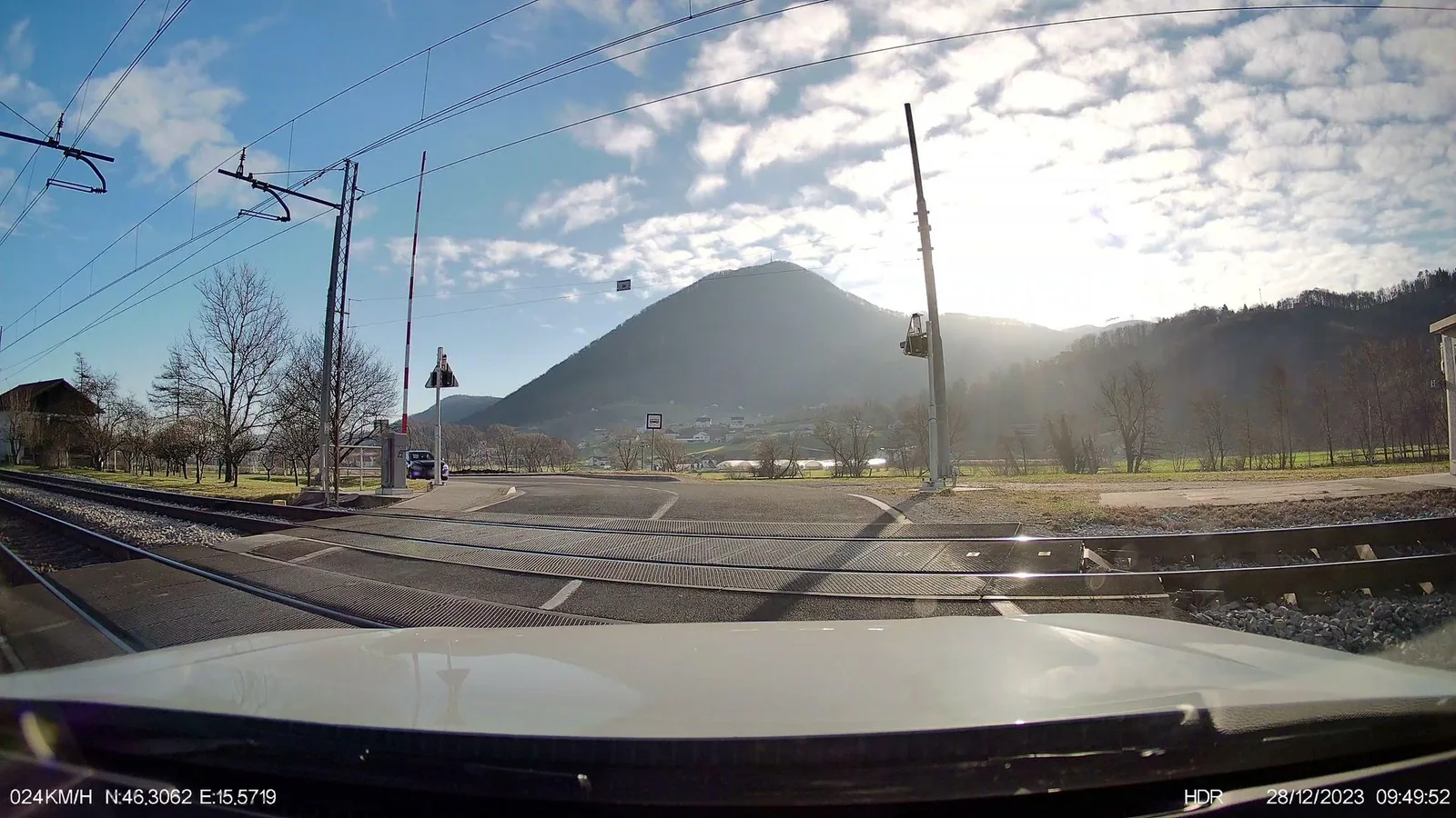 Street-level view of a level crossing in Slovenia