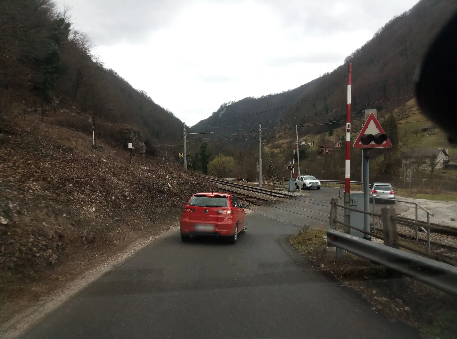 Street-level view of a level crossing in Slovenia
