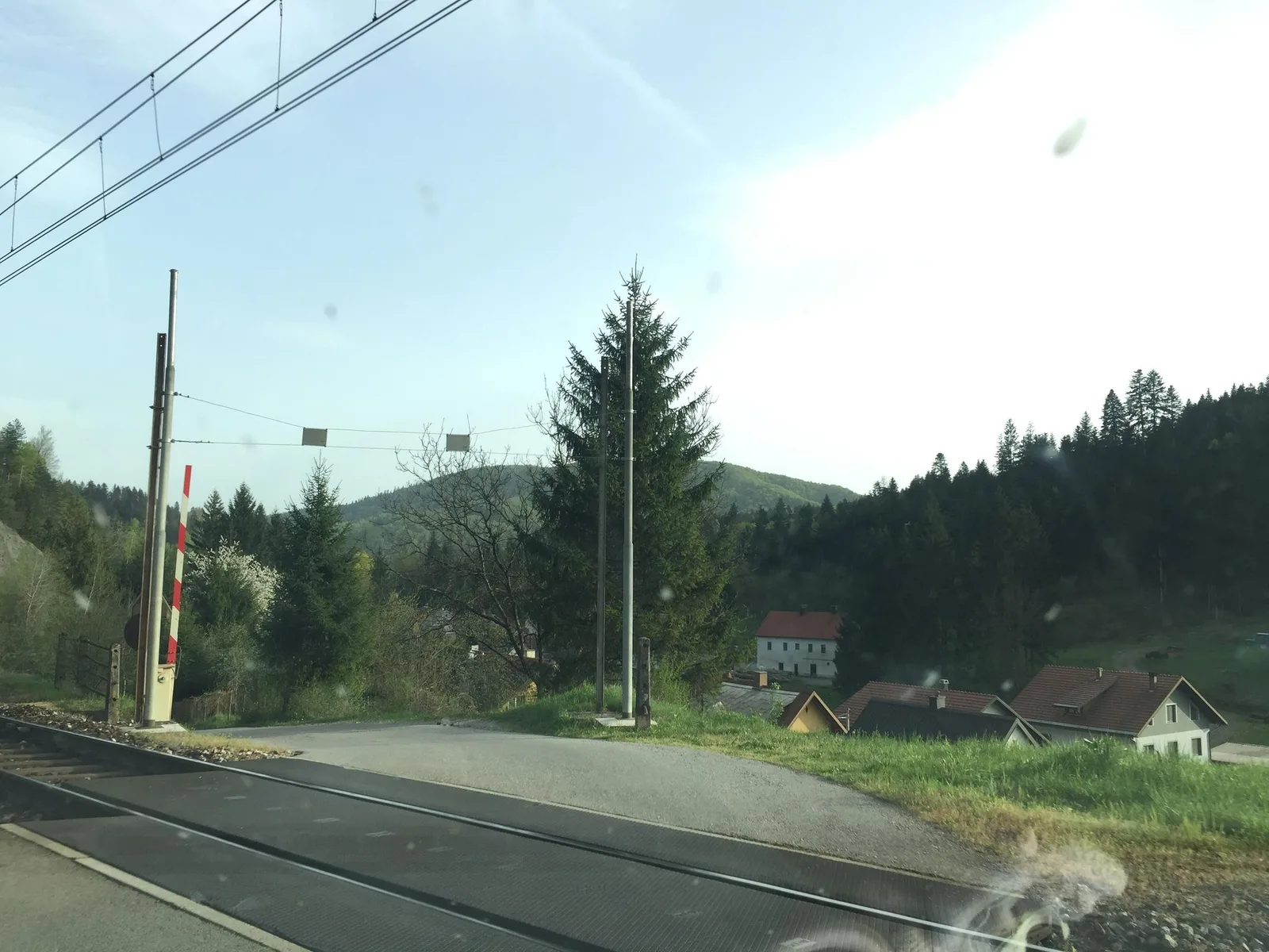 Street-level view of a level crossing in Slovenia
