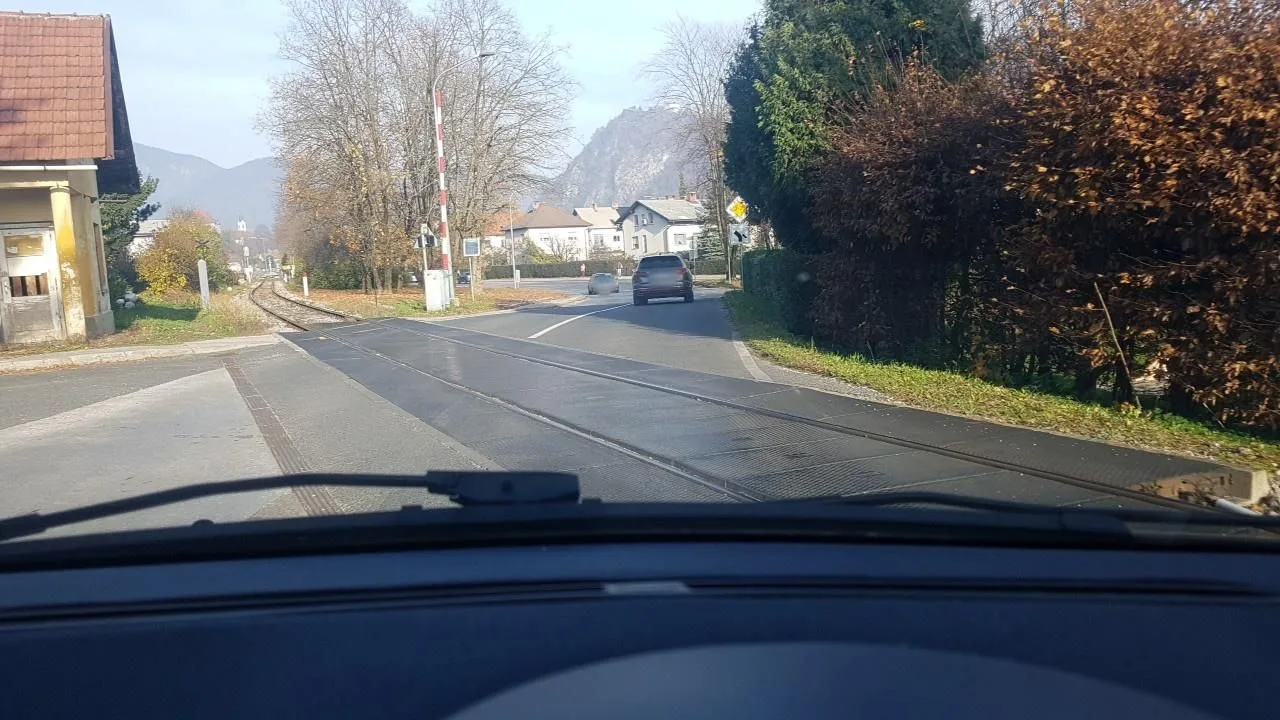 Street-level view of a level crossing in Slovenia