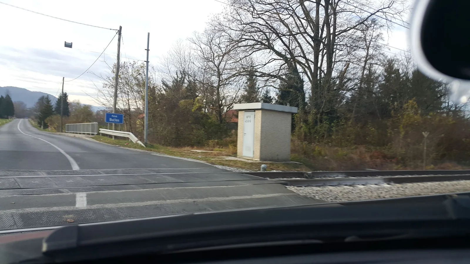 Street-level view of a level crossing in Slovenia