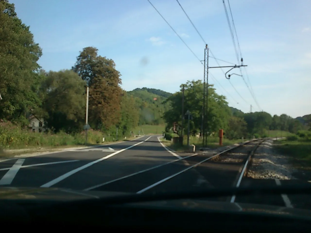 Street-level view of a level crossing in Slovenia