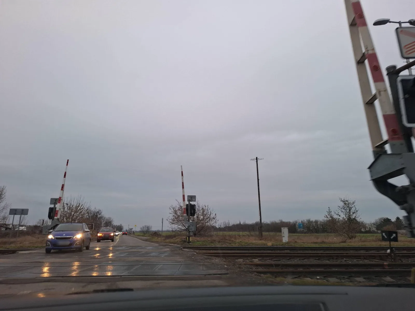Street-level view of a level crossing in Slovakia