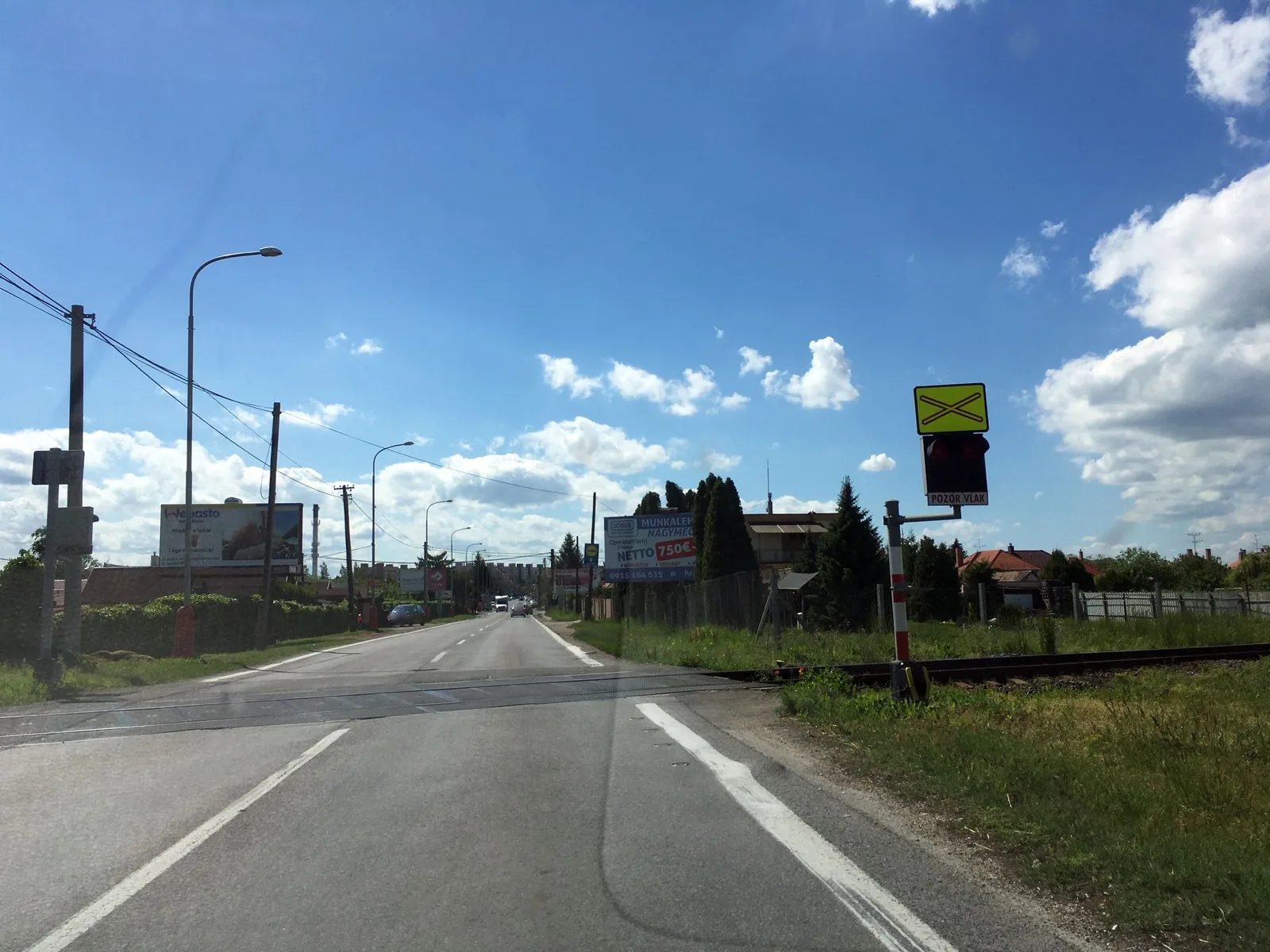 Street-level view of a level crossing in Slovakia