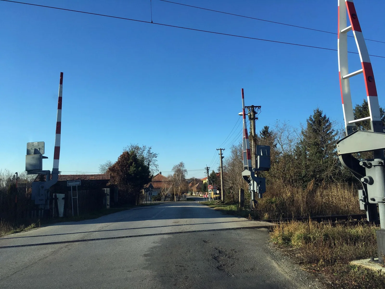 Street-level view of a level crossing in Slovakia