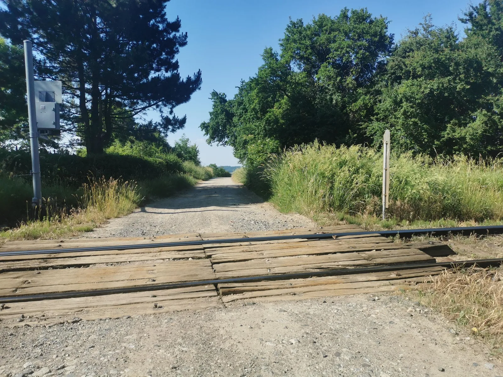 Street-level view of a level crossing in Slovakia
