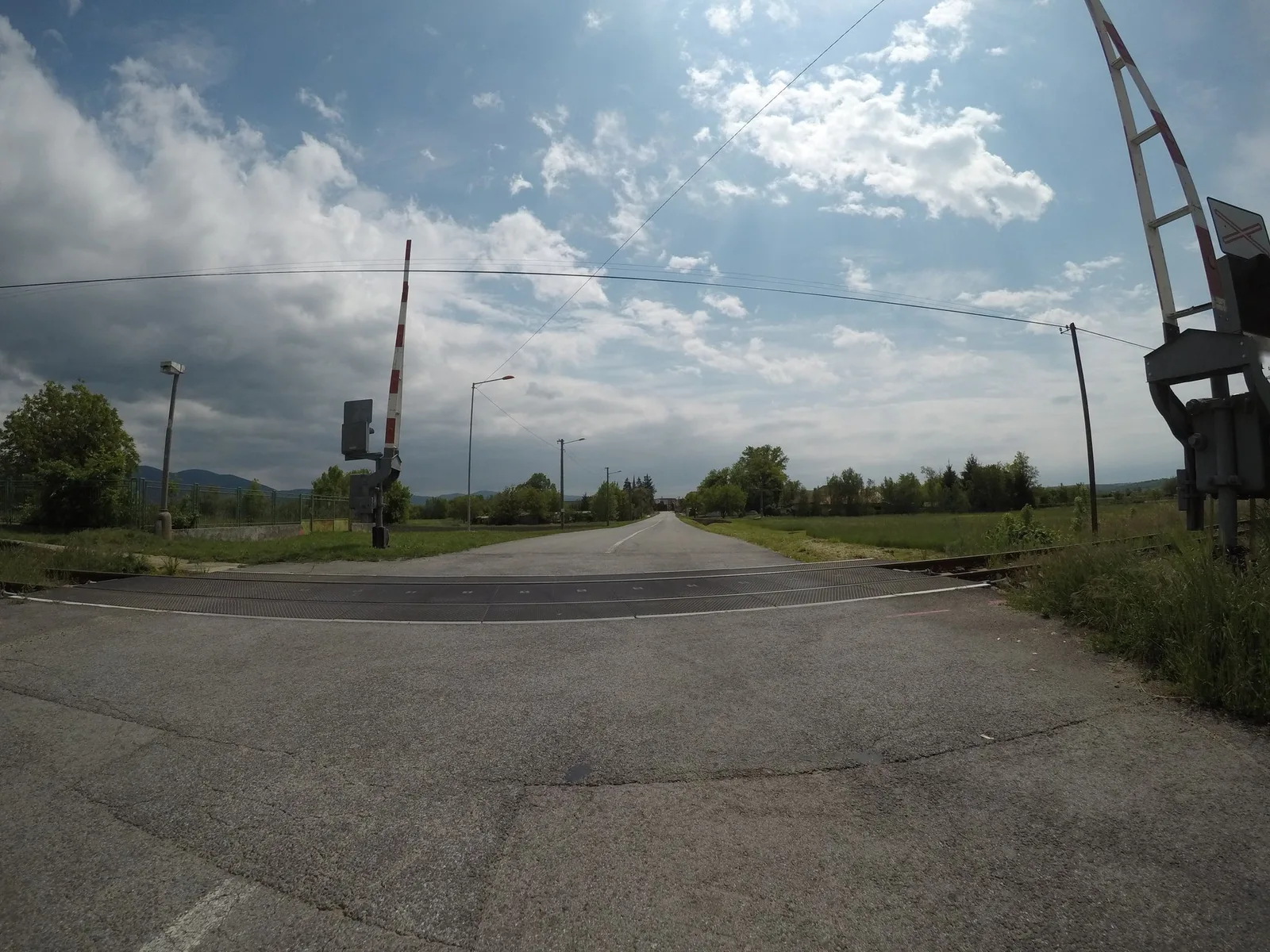 Street-level view of a level crossing in Slovakia