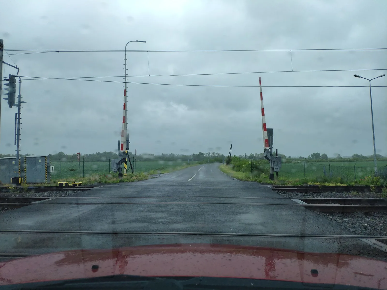 Street-level view of a level crossing in Slovakia