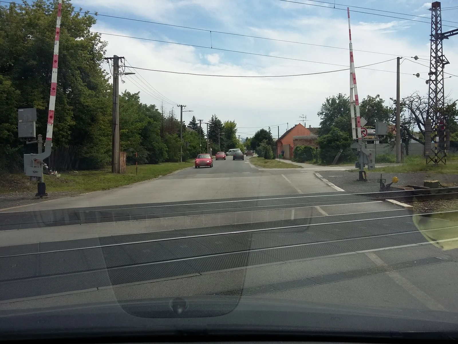 Street-level view of a level crossing in Slovakia