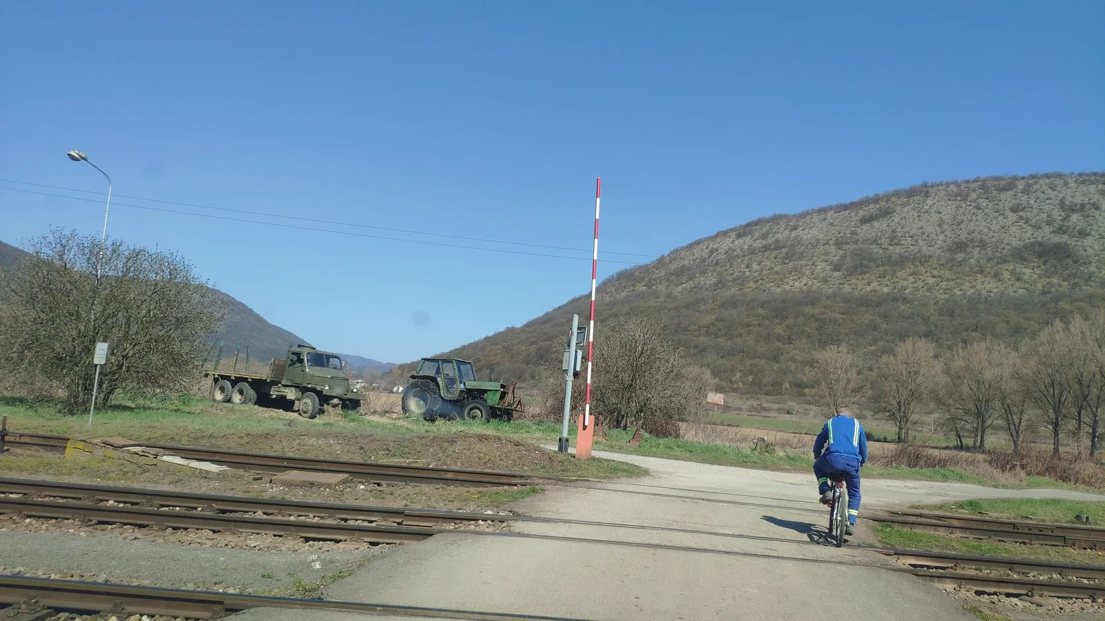 Street-level view of a level crossing in Slovakia