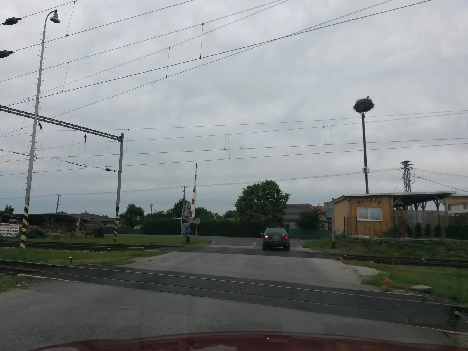 Street-level view of a level crossing in Slovakia