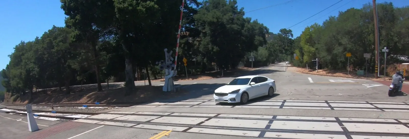 Street-level view of a highway-rail grade crossing in Livermore, California