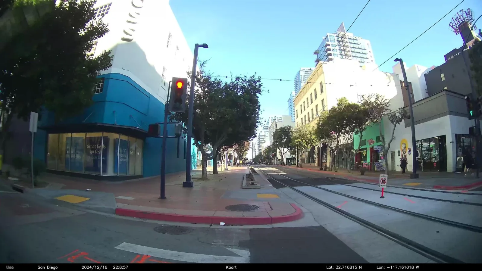 Street-level view of a highway-rail grade crossing in San Diego, California