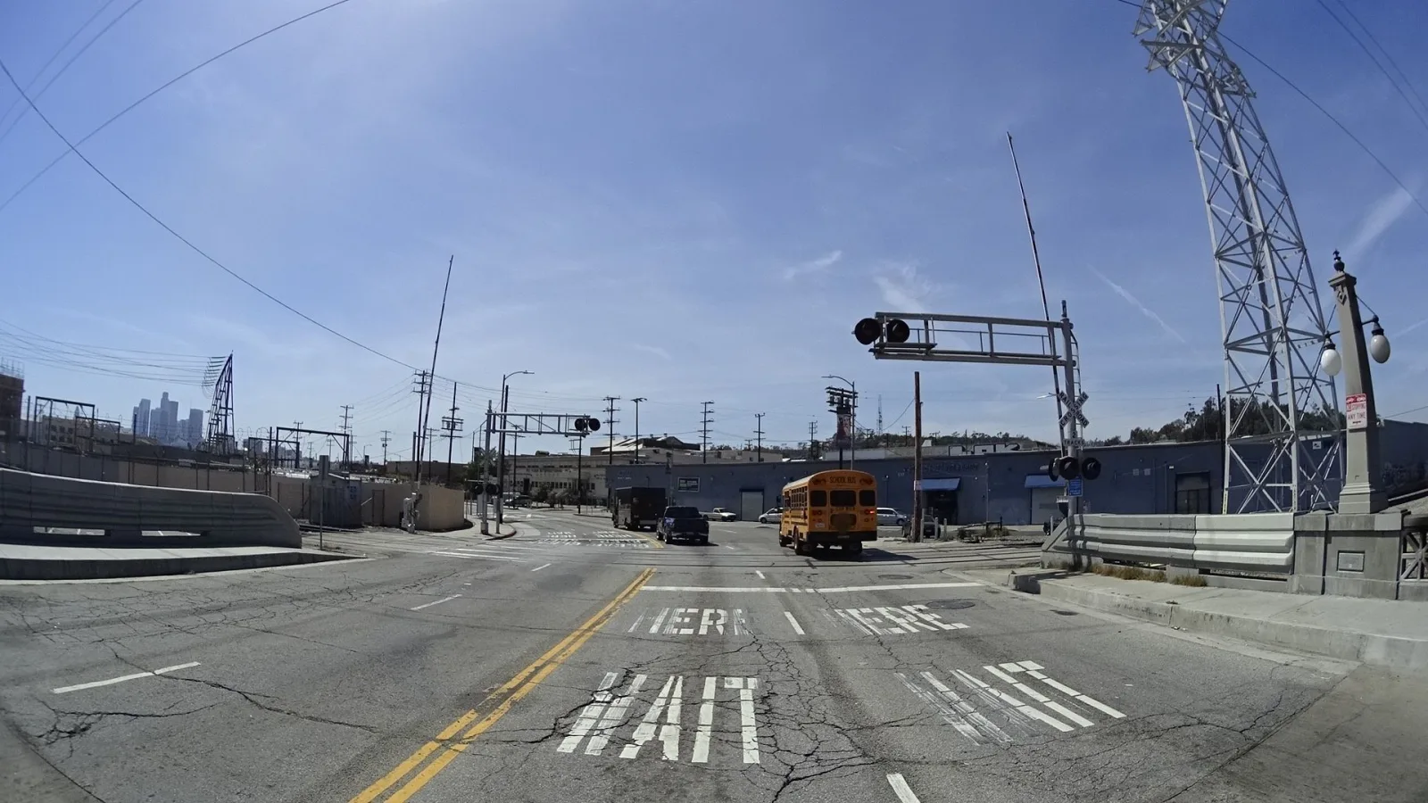 Street-level view of a highway-rail grade crossing in Los Angeles, California