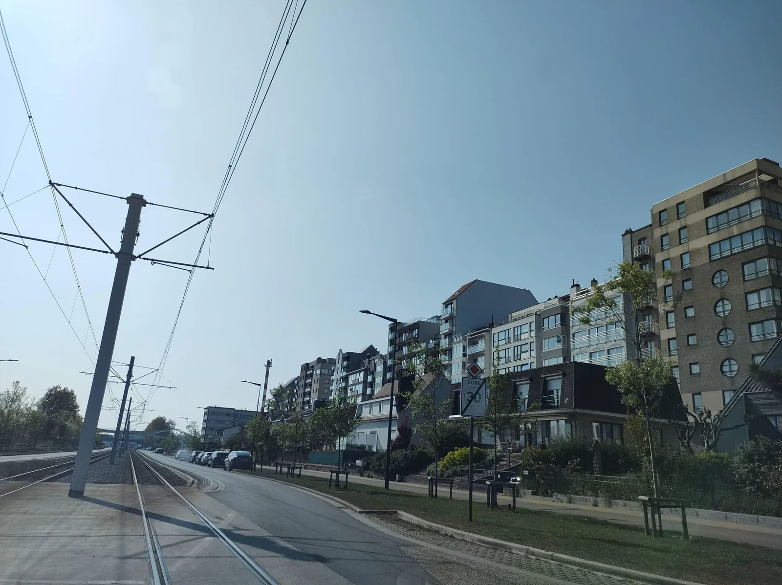 Street-level view of a level crossing in Belgium
