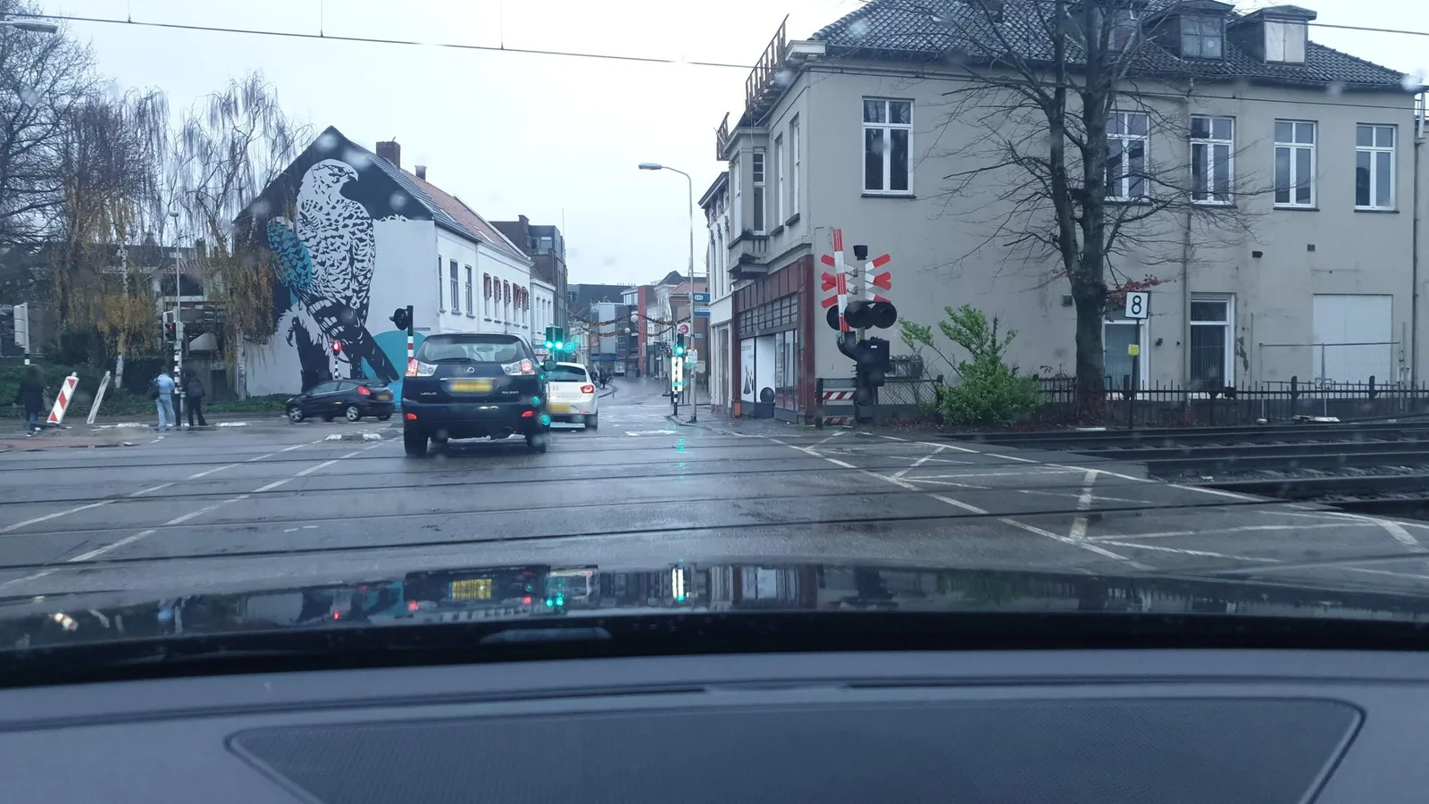Street-level view of a level crossing in the Netherlands