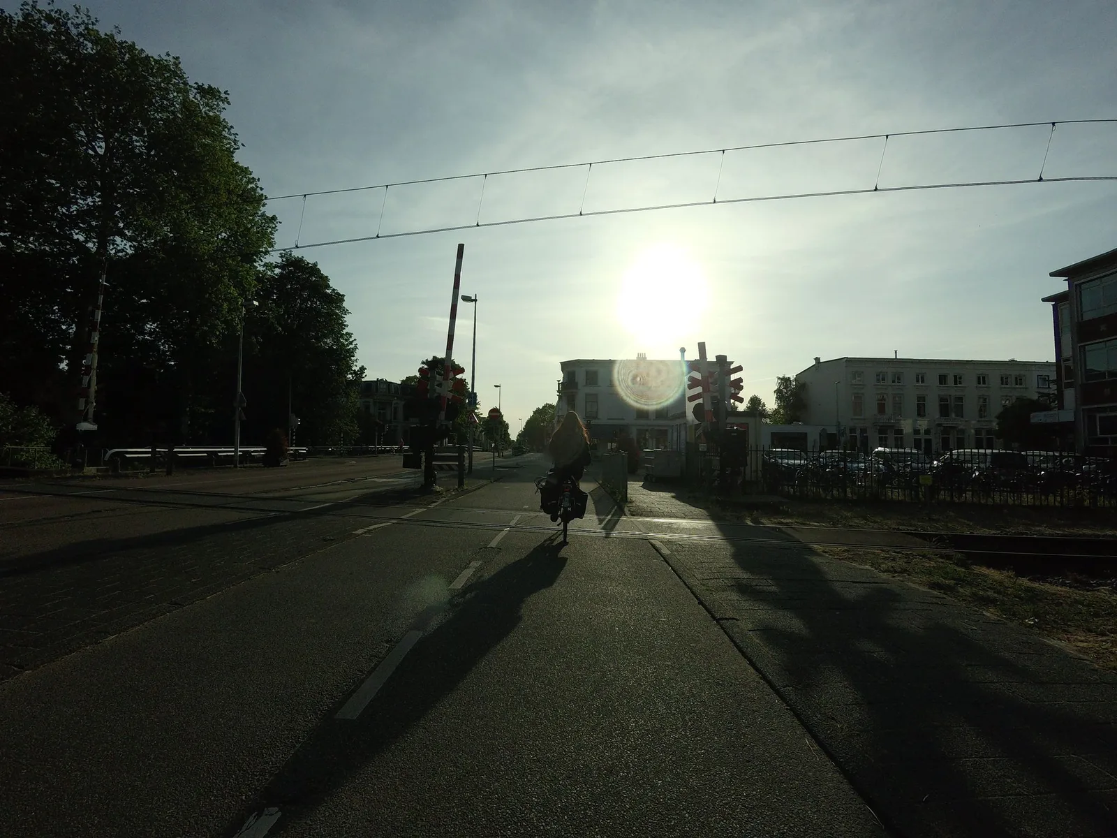 Street-level view of a level crossing in the Netherlands
